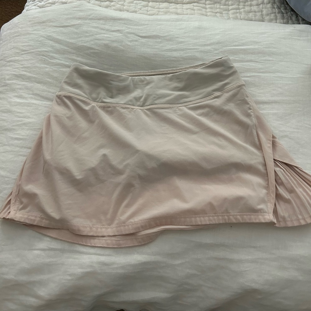 pleated pink lululemon tennis skirt